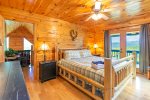 Master Bedroom Features a King Size Bed, Private Deck, and Flat Screen TV